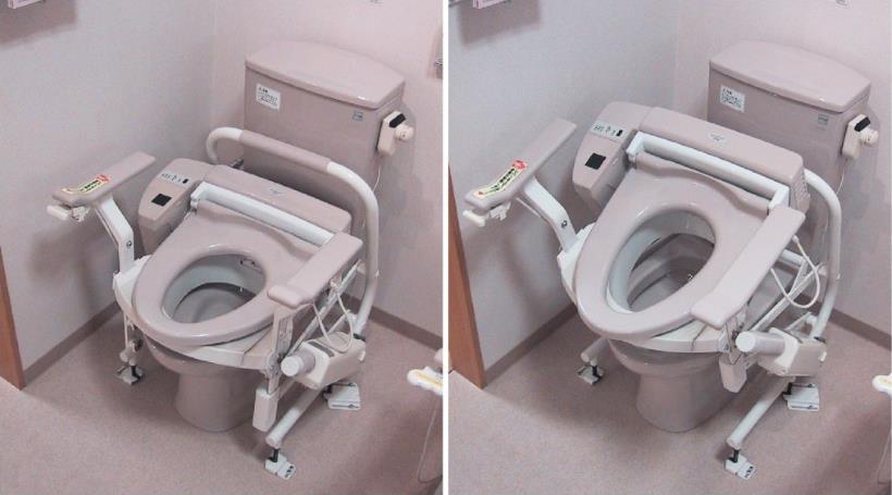 Electrically raised toilet seat
